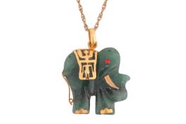 An elephant pendant on chain, the dyed quartzite carved as a stylised elephant with rhinestone eye, 