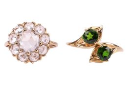 Two gem-set rings in 9ct gold; to include an open crossover ring terminated with two circular-cut ch