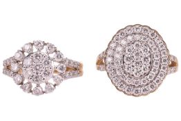 A pair of diamond-set diamond cluster rings, each claw-set throughout with brilliant-cut diamonds, a