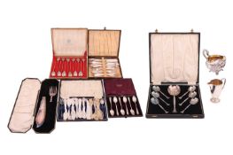 A Russian case of twelve condiment spoons by Grachev Brothers, with tapered bamboo handles and fig-s