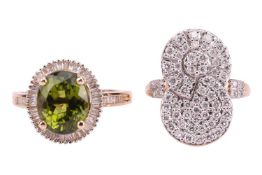 Two rings; comprising a peridot and diamond-set cluster ring, with a central oval mixed-cut peridot,