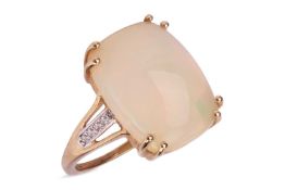 An opal and diamond ring, the cushion-shaped cabochon opal, weighing approximately 5.99cts, between 