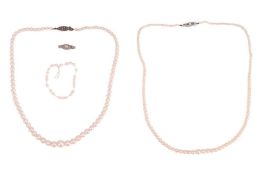 A pair of pearl necklaces, each of graduated design, the first with 80 2.3mm–5.4mm pearls, the secon