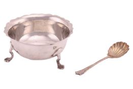 A silver sugar bowl with shaped rim, on three webbed feet, by Stokes & Ireland Ltd., Chester 191