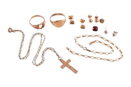 A group of jewellery items, to include; A cross pendant marked '9ct' on a base metal chain; A broken