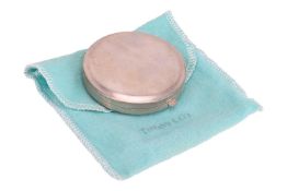 Tiffany & co. - a round compact, with mirror in the interior, signed and stamped '925 sterling',