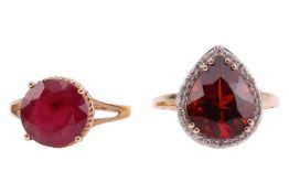 Two rings comprising a fracture-filled ruby solitaire ring, with twist surround, leading to bifurcat