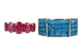 Two gem-set rings, 1st) claw-set with five graduated oval-shaped rubies, the largest to the centre, 