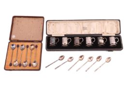 Cased set of six silver whisky tots, Birmingham 1923, and cased set of six coffee spoons, Birmingham