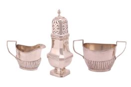 A silver creamer and sugar bowl by David & Maurice Davis, London, Birmingham 1895, with half ree