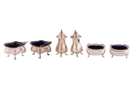 A group of early 20th century silver cruets comprising, a pair of baluster pepper casters, a pair of