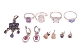 A group lot of jewellery, including a paste single-stone ring, an amethyst and earring suite, stampe