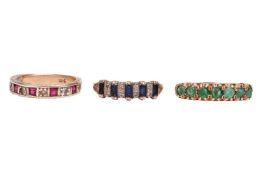 Three gem-set rings, comprising an emerald half hoop ring, in 9ct gold, size N1/2, a synthetic ruby 