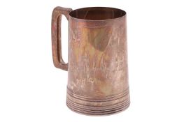 A silver presentation pint tankard by Walker & Hall, Sheffield 1937, the polished tapering cylin