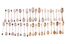 A set of twelve Swedish silver gilt demi-tasse spoons, together with a set of six reproduction Charl