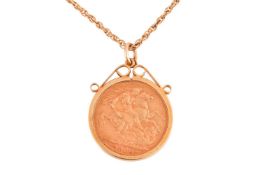 A Victorian 1889 full sovereign in a 9ct gold detachable pendant mount with scrolled surmount, on a 