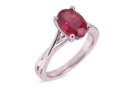 A glass-filled ruby single-stone ring by Abelini, the oval-shaped ruby, stated weight 1ct, within a 