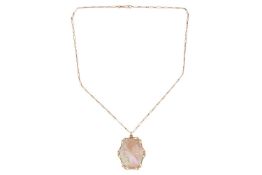 A mother of pearl cameo on chain, the cameo of oval form carved to depict the side profile of a lady