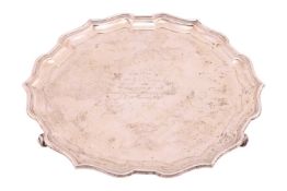 A large silver presentation salver, by Adie Brothers Ltd., Birmingham 1933, of circular form with ‘B