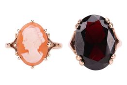 A garnet dress ring in 9ct gold, size M½; and a carved shell cameo ring in 9ct gold, size N½; Total 