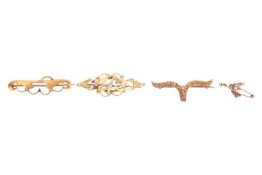 Three brooches, comprising a yellow metal brooch of scroll design, stamped '15ct', a 9ct gold V-shap