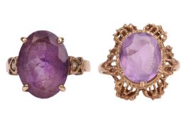 Two amethyst dress rings in 9ct gold; one in a Modernist surround, the other set between heart shoul