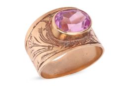 A synthetic pink sapphire dress ring, the tapering wide band collet-set with an oval-cut synthetic p