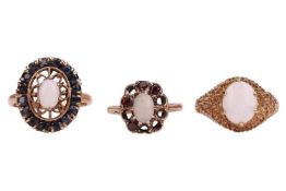 Three opal dress rings; The first an opal and blue sapphire cluster ring, in 9ct gold, size P 1/2, 5