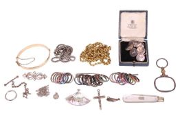 A group of costume jewellery, to include thirty-one enamelled rings and a plain band ring, of varyin