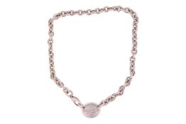 Tiffany & Co. - a silver 'Return to Tiffany' necklace, with an oval plaque on a heavy cable link