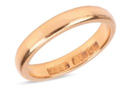 A wedding band in 22ct gold, containing a plain and polished D-profile band, Birmingham assay marks,