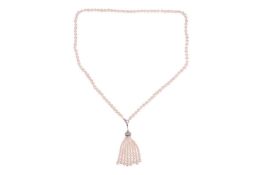 A cultured pearl sautoir necklace, the cultured pearl necklace leading to a detachable cultured pear