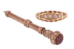 A diamond five stone ring, featuring five graduating old-cut diamonds grain-set in a lozenge-shaped 