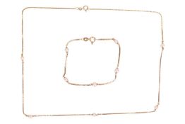 A cultured pearl-set station chain necklace and bracelet, both connected with box links and set in 9