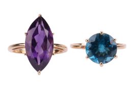 Two gem-set rings in 9ct gold; the first contains a navette-cut amethyst of 17.5 x 9.1 mm, the other