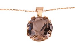 A smoky quartz pendant on chain, claw-set with a large circular-cut smoky quartz of 14.0 mm, with a 