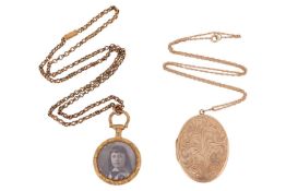 Two lockets on chains; The first an oval hinged locket engraved with folaite detail, on a fine curb 