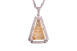 A citrine and diamond pendant on chain, the pendant featuring a triangular fancy cut citrine, with a