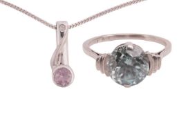 A zircon ring and an amethyst pendant, the zircon ring of the later Art Deco period, featuring a rou