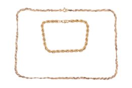 A braided necklace and a bracelet; The necklace constructed with three rows of serpentine links, in 