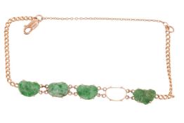 A Chinese carved jade link bracelet, comprising five jadeite panels carved as Ruyi and stylised clou