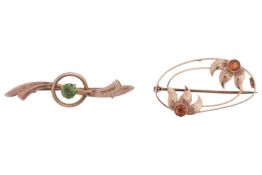 Two Edwardian gem-set brooches, the first of foliate design, stamped 9ct, set with two citrines, the