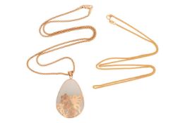 A 14ct pendant on chain together with a 22ct chain; the pendant featuring a green hardstone of pear 