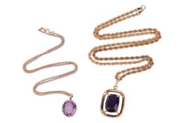 Two amethyst pendants on chains; The first featuring a cushion-shaped amethyst in a claw-setting, to