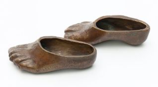 Paar Bronzefüße. 