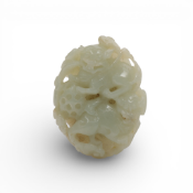 China, a celadon jade openworked roundel, Qing dynasty (1644-1912),