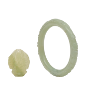 China, a jade bracelet and a pendant, 20th century,