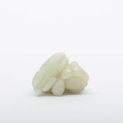 China, a celadon jade family group, Qing dynasty (1644-1912),