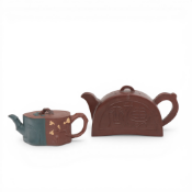 China, two Yixing earthenware teapots and covers,
