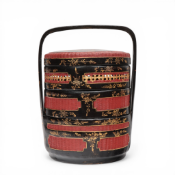 China, a bamboo and lacquered three-tiered wedding basket, 20th century,